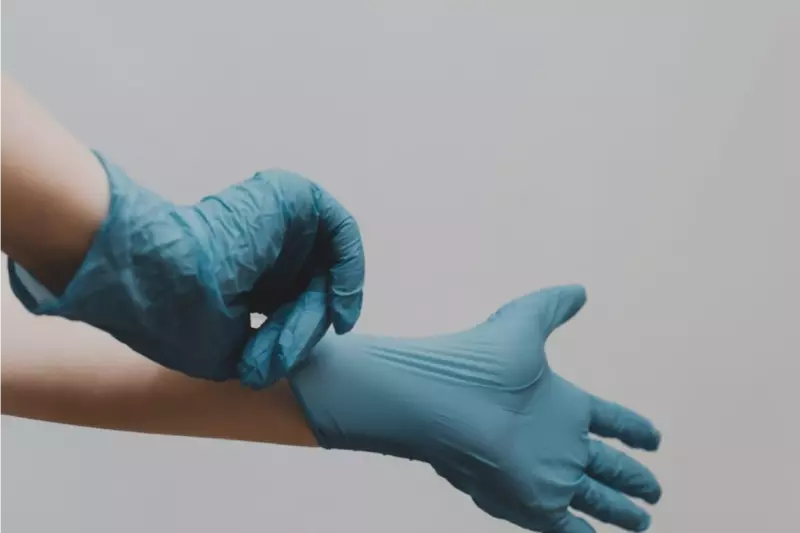 putting on gloves