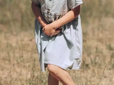 woman holding bladder